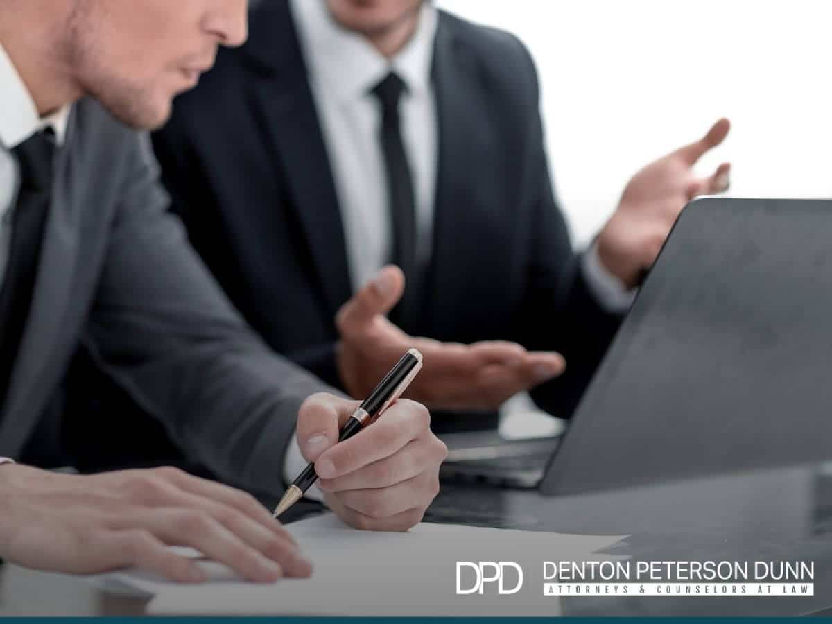 Men deciding the llc structure of their business with tips from Denton Peterson Dunn's blog