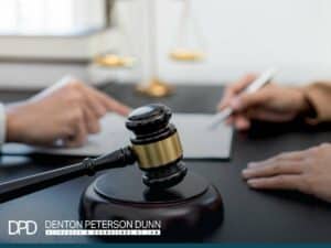 The Plaintiff’s legal case discussion with gavel on desk