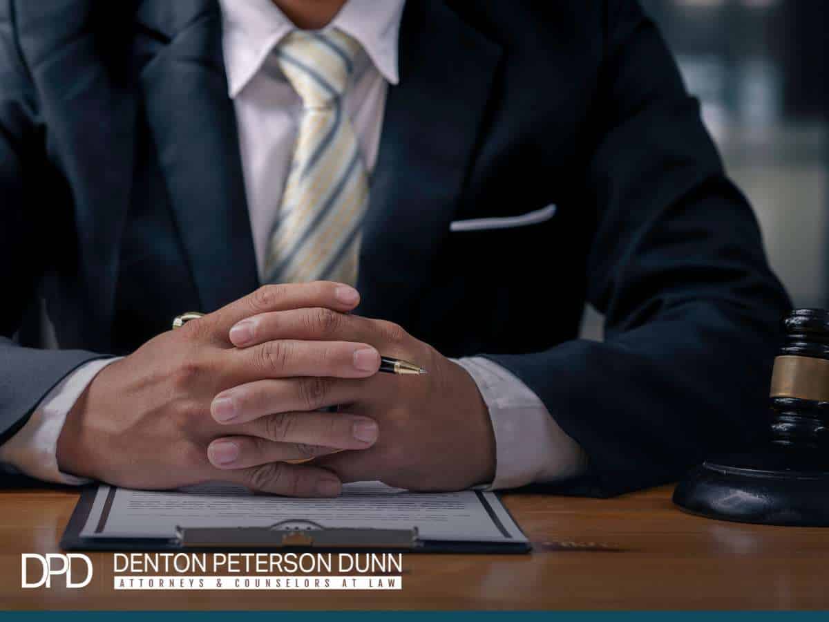 Estate Planning attorney reviewing documents at desk